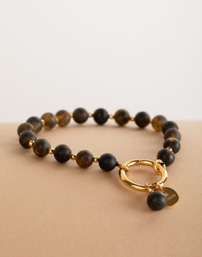 beaded bracelet with 7mm natural black amber in gold vermeil sterling silver golden nero
