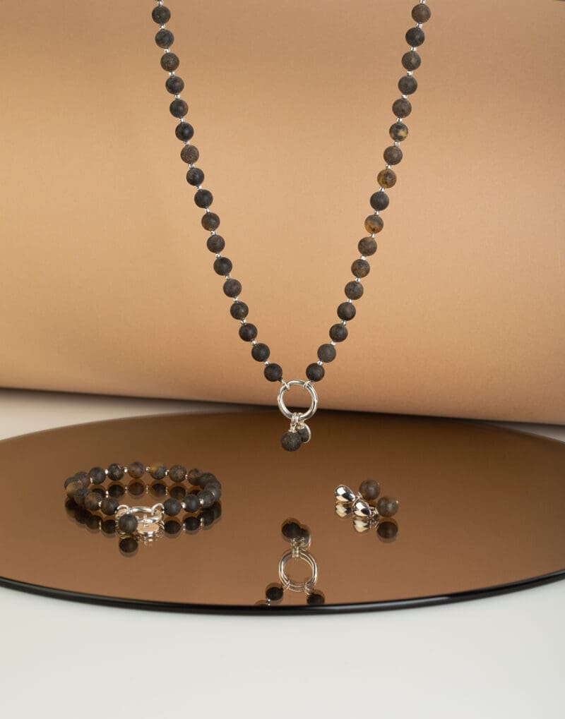beaded necklace bracelet and drop earrings set with natural black amber in sterling silver nero by mondri jewelry