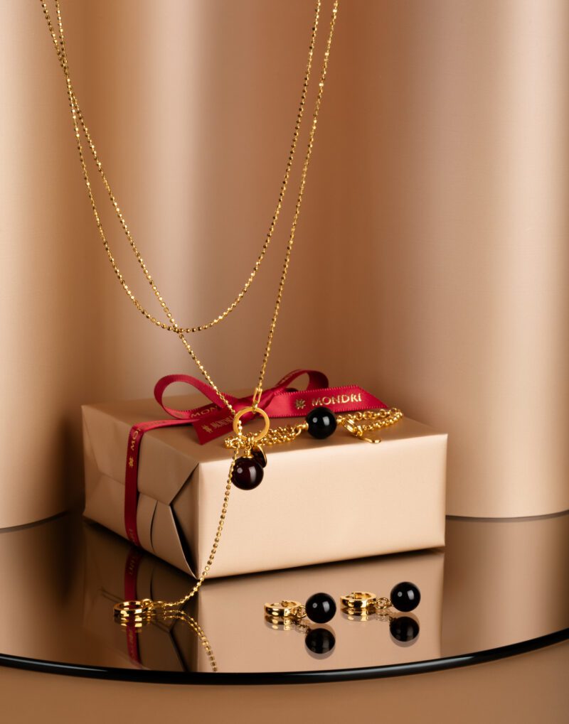 lariat necklace with 12mm red amber pendant set drop earrings and bracelet in 24k gold sterling silver chain golden cherry mondri jewelry